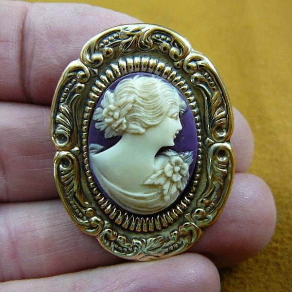Woman with flower up in hair and on shoulder ivory purple CAMEO pin pendant ornate oval brass brooch cred-41