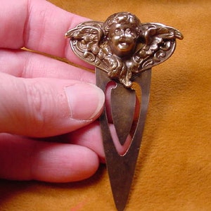 happy little Cupid angel head with wings spread  scrolled heart brass BOOKMARK book mark books CBBS-4