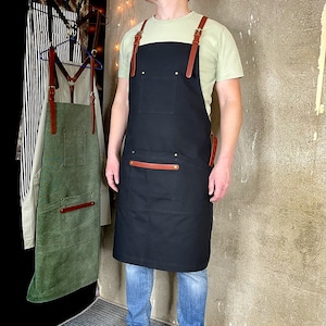 Apron for men. Cotton canvas with cross-back leather straps.
