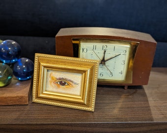 Framed art Lover's Eye original art in a wooden frame