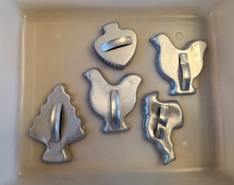 Vintage aged cookie cutters Santa Christmas tree hens