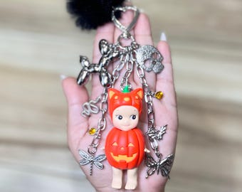 Llavero con forma de ángel Sonny hecho a mano para bolso / Gato con parche de calabaza