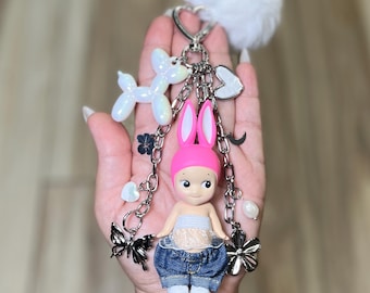 Chaveiro artesanal Sonny Angel para bolsa | Coelho olhando para trás