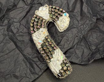 The Noir Cane: Avant-Garde Crystal Candy Cane Brooch