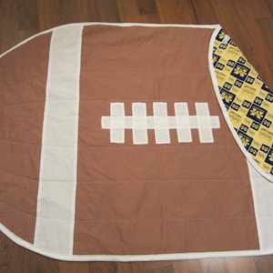 Couverture de football U of M