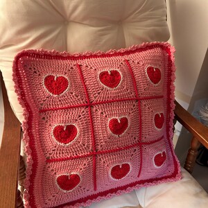 valentine heart granny square pillowcase,pink red heart crochet pillow cover romantic,18 inch heart pillowcase handmade,dimensional heart applique pillow cover,valentine day gift home decor,romantic pink red white heart pillowcase,ruffled border heart pillow cover,galentine gift for her,love theme decorative pillowcase,granny square heart pillow cover,valentine bedroom decor,handmade romantic pillow cover,heart gift for girlfriend wife,valentine living room decor,love pillowcase handcrafted