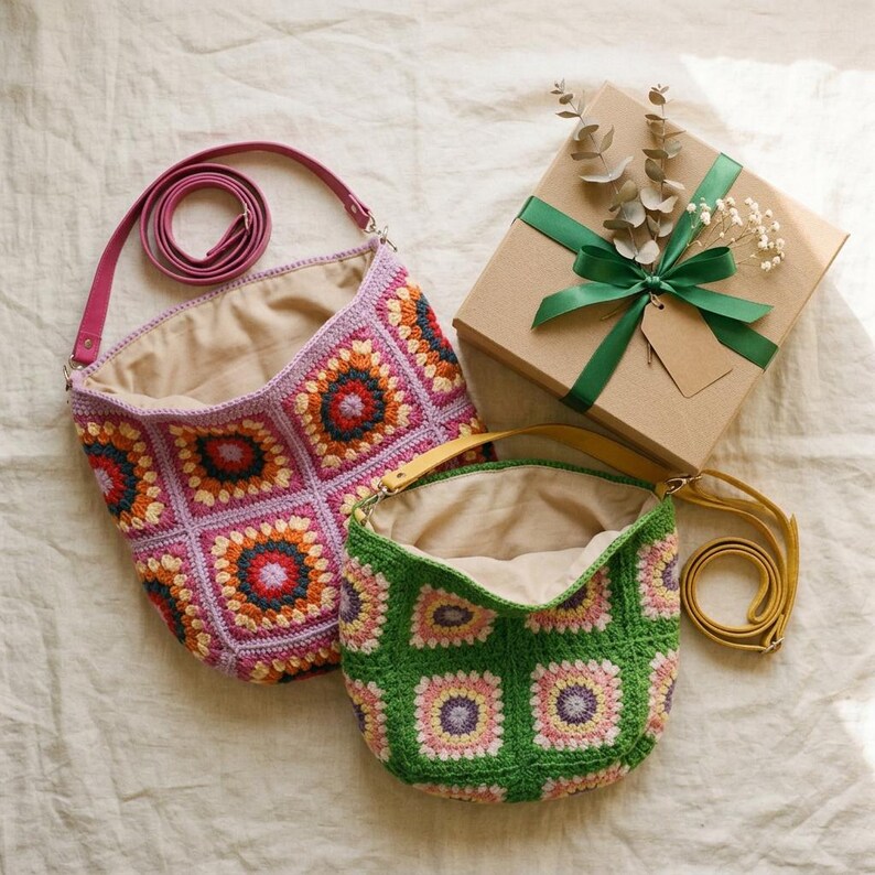colorful granny square crossbody bag,handmade crochet shoulder bag adjustable,vintage circular flower bag leather strap,boho crossbody bag lined,retro granny square purse handmade,adjustable leather strap shoulder bag,festival crossbody bag colorful,lined crochet bag secure closure,gift for her crossbody bag,vintage style shoulder bag handmade,bright granny square bag,hands free crossbody crochet,travel bag adjustable strap,unique handmade purse granny square,sustainable fashion crossbody bag