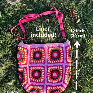 colorful granny square crossbody bag,handmade crochet shoulder bag adjustable,vintage circular flower bag leather strap,boho crossbody bag lined,retro granny square purse handmade,adjustable leather strap shoulder bag,festival crossbody bag colorful,lined crochet bag secure closure,gift for her crossbody bag,vintage style shoulder bag handmade,bright granny square bag,hands free crossbody crochet,travel bag adjustable strap,unique handmade purse granny square,sustainable fashion crossbody bag