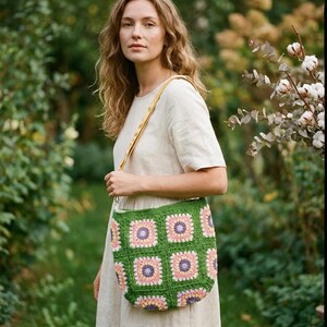 colorful granny square crossbody bag,handmade crochet shoulder bag adjustable,vintage circular flower bag leather strap,boho crossbody bag lined,retro granny square purse handmade,adjustable leather strap shoulder bag,festival crossbody bag colorful,lined crochet bag secure closure,gift for her crossbody bag,vintage style shoulder bag handmade,bright granny square bag,hands free crossbody crochet,travel bag adjustable strap,unique handmade purse granny square,sustainable fashion crossbody bag