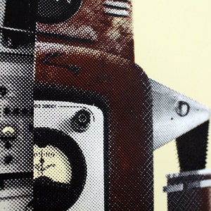 May include: Close-up of a vintage-style machine with a brown, black, and white color scheme. The image has a halftone dot pattern, giving it a retro aesthetic. The machine has dials, gauges, and other mechanical components.