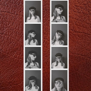 May include: Eight black and white photo booth images. Each shows a person wearing a black beret and glasses. The images are arranged in two vertical columns against a textured, reddish-brown background, reminiscent of leather.