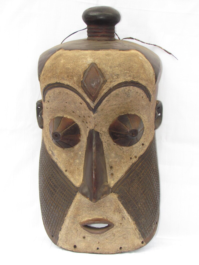 May include: A set of three ceramic mugs with a speckled, matte finish. The mugs are in cream, light grey, and dark grey. Each mug has a simple, minimalist design and a rounded handle.