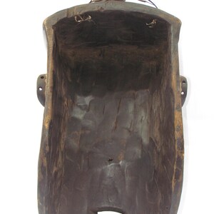 May include: A white ceramic mug with a black handle and the text "But First, Coffee" in a black, bold font. The mug is on a white surface.