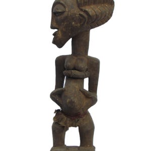 Original Female Songye Vintage Statue facing at the right hand side, Carved Wood Congo Sculpture DRC Africa Antique Art Brown Floor Table.