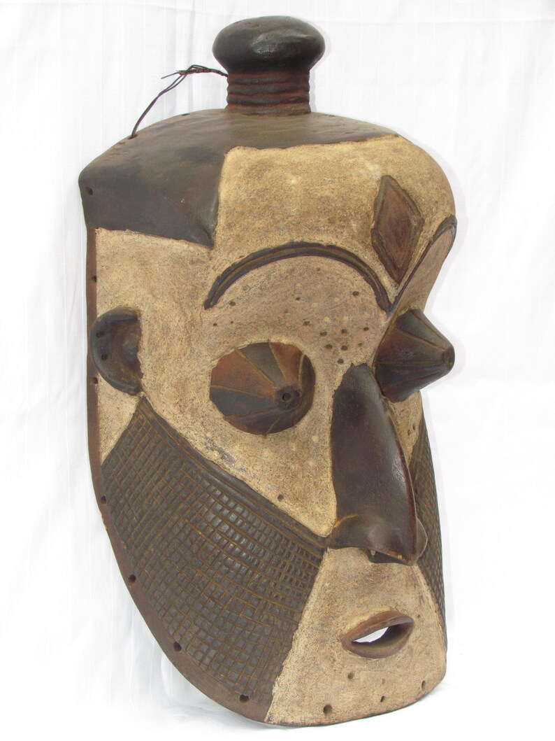 May include: A set of three ceramic mugs with a speckled, matte finish in cream, light grey, and dark grey. Each mug has a simple, minimalist design, suitable for coffee or tea.