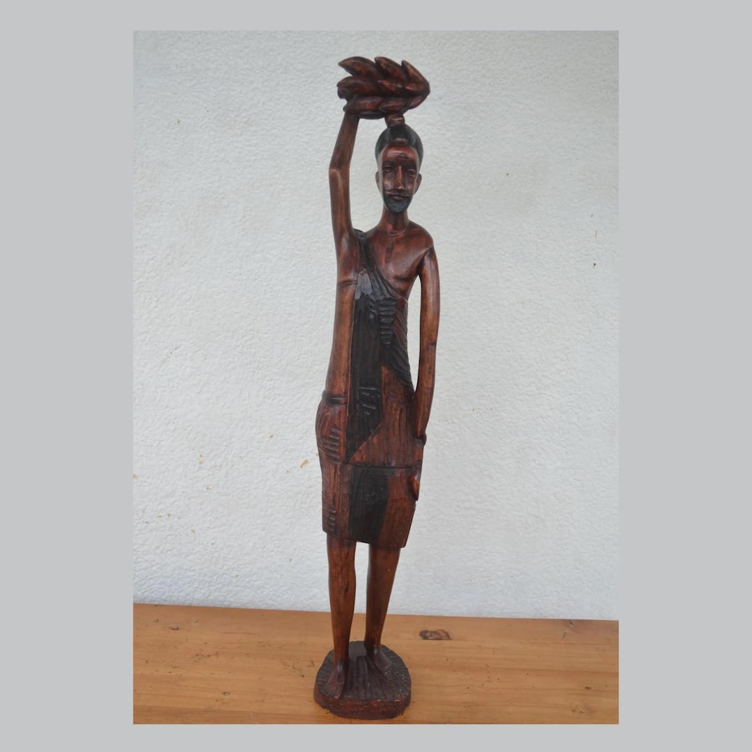 Hand Carved Basinga Worker – 34