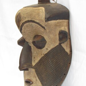 May include: A distressed wooden sign with the words "Welcome to our home" in white lettering. The sign has a rustic finish, ideal for adding a welcoming touch to a front door.