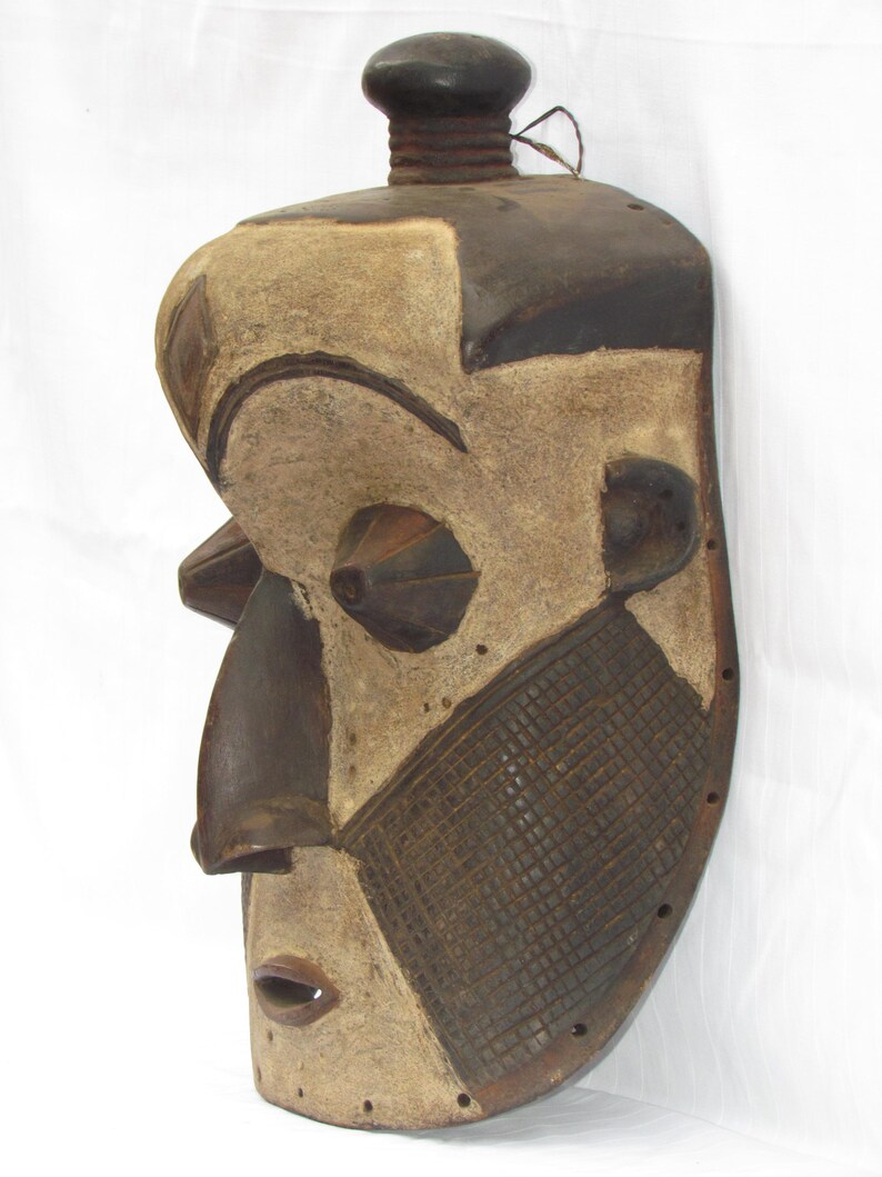 May include: A distressed wooden sign with the words "Welcome to our home" in white lettering. The sign has a rustic finish, ideal for adding a welcoming touch to a front door.