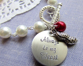 Always in my heart, peanut, birthstone color pearl, bracelet.