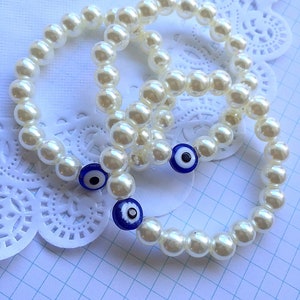 Evil eye kids bracelet, evil eye jewellery, evil eye jewelry, plastic pearl bracelet, SET of FIVE.