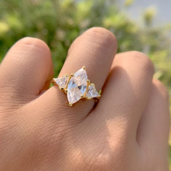 Marquise Diamond Hidden Halo Ring: Baguette Side Stone, Minimalist