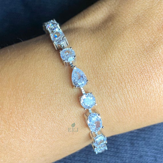 Moissanite Tennis Bracelet: Multi-shape Sterling Silver, D-E-F VVS 