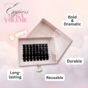 May include: A box of black D curl eyelash extensions. The box is open, revealing the lashes arranged in rows. Text on the box reads "Empress Mega Volume" and "Icy Lash Beauty". Additional text includes "Bold & Dramatic", "Durable", "Long-lasting", and "Reusable".