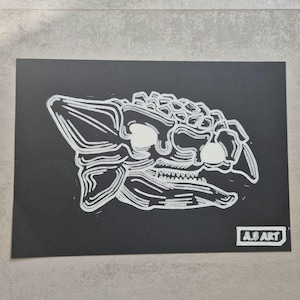 Handmade A4 Ankylosaurus Skull Lino Print - White Ink on Black Card