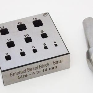 May include: A silver-coloured Emerald Bezel Block with square indentations numbered 4 to 14, and a matching metal tool. The block is labelled "Emerald Bezel Block - Small Size - 4 to 14 mm."