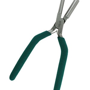 May include: Green handled pliers with a silver metal head. The pliers are designed for making jewelry.