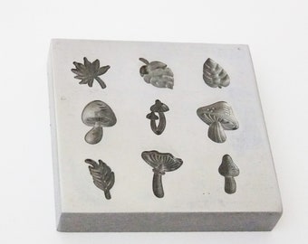 Shot Plate 9 Designs Mushrooms Etc.  impression dies | silversmith supplies | silversmith tools | metal stamps for jewelry | metal stamps |