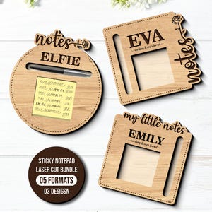 May include: Wooden sticky note holders with laser-cut designs. One round holder has "ELFIE" and a pen. Two square holders say "EVA" and "EMILY". The image also includes a round sticker that says "STICKY NOTEPAD LASER CUT BUNDLE 05 FORMATS 03 DESIGNS".