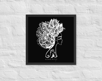May include: Black and white line art print of a woman's face with a floral design on her head. The text "the month shivaya" is at the bottom of the print.