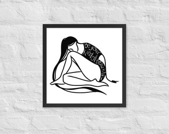 May include: Black and white framed art print featuring a minimalist line drawing of a person in a seated pose. The artwork includes the text "be your kind of beautiful" in a handwritten style. The frame is black.