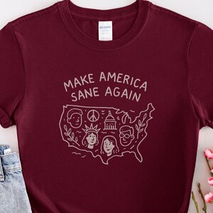 Make America Sane Again, carte des États-Unis, t-shirt griffonné, déclaration politique dessinée à la main, tenue de protestation d'un militant symbole de paix inclusif