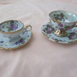 Vintage Collectible Teacup And Saucer - Lot Of 2 - Violets - Made In Japan - Purple - White - Gold - Trimont Ware