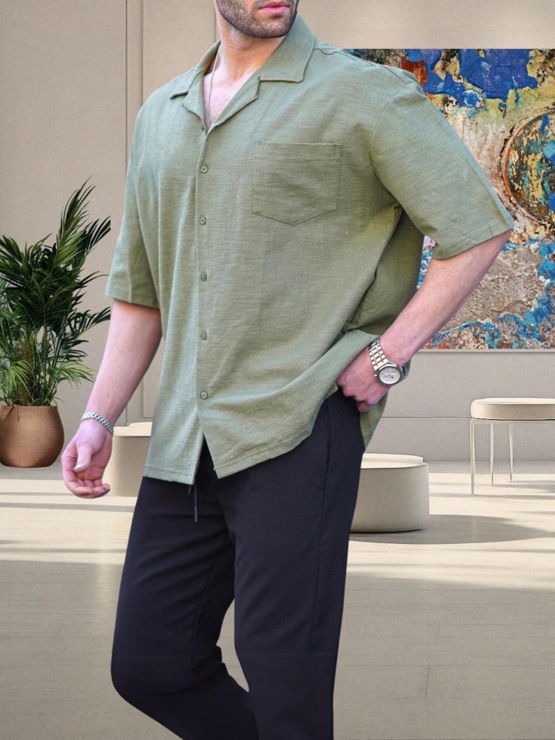 Crafted from high-quality, breathable cotton blend fabric, this stylish shirt offers a soft touch against the skin while ensuring durability. Designed with a relaxed fit, it falls perfectly over the shoulders for that effortlessly chic look. Whether you're lounging at home, running errands, or meeting friends for brunch