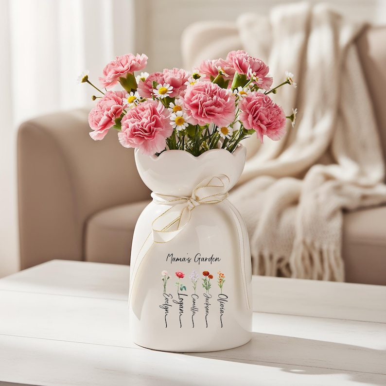 May include: A set of three ceramic mugs with a speckled, matte finish. The mugs are in shades of cream, light gray, and dark gray. Each mug has a simple, minimalist design and a rounded handle.