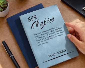 May include: A blue journal with the text "NEW Chapter" and a quote about new beginnings. The quote reads "Now your compass points to sunlit horizons - May chapters written in ink become stories lived in gold, Where every sunset you've earned reflects dawns yet untold." The journal is signed "ELIAS ROGERS".