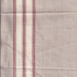 May include: A close-up of a white fabric with thin red stripes. The fabric has a subtle texture and a slightly off-white color.
