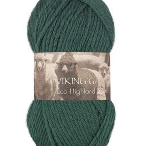 May include: A ball of dark forest green yarn with a paper label featuring a sepia-toned photograph of sheep. The label text reads VIKING GARN Eco Highland Wool. The yarn is wound into a thick, rounded skein with a visible twisted fiber texture.