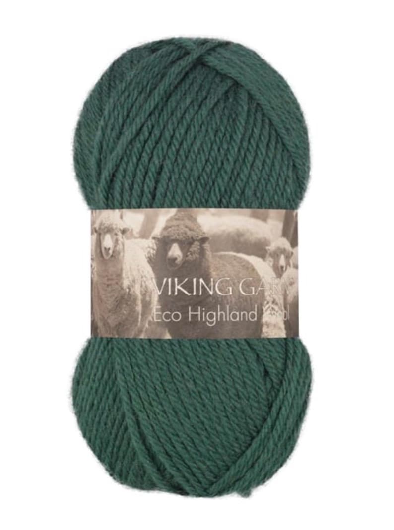 May include: A ball of dark forest green yarn with a paper label featuring a sepia-toned photograph of sheep. The label text reads VIKING GARN Eco Highland Wool. The yarn is wound into a thick, rounded skein with a visible twisted fiber texture.