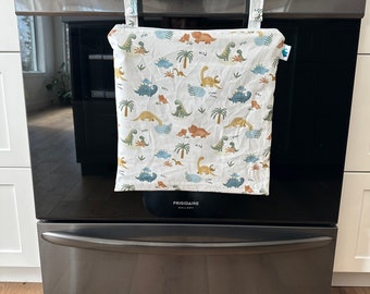 Reusable Large Wet Bag. Perfect for Diapers, Travel, Gym, Pool, Beach. Heat Sealed to be Fully Waterproof. Available in FOUR sizes.