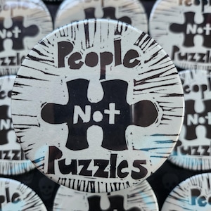 People Not Puzzles block-printes pinback button | autistic pride/support (3")
