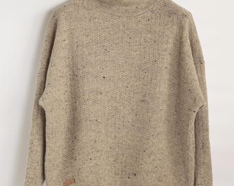 Artisanal Scottish merino wool sweater, loose fit, handcrafted natural wool knit, playful tuck stitch pattern