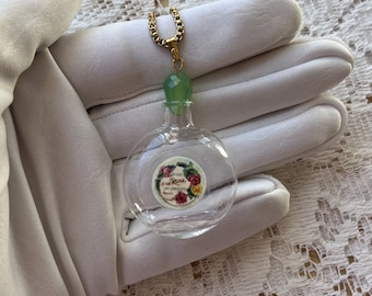 Little Clear Round Glass Perfume Bottle Necklace, Vintage Paper Floral Red and Yellow Roses Perfume Label Copy, Green Crystal Stopper