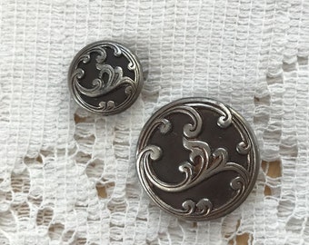 Two Vintage Lightweight Buttons, Swirled / Ocean Waves or Trumpet Flower Silver Tone or Steel Design, Chocolate Brown Background, Two Sizes