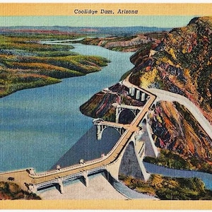 May include: Vintage postcard featuring Coolidge Dam in Arizona. The image shows a large dam spanning a river, with a road running across it. The landscape includes mountains and a body of water, with text at the top.