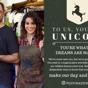 May include: A couple working on leather goods in a workshop. The woman is wearing a brown leather apron and a plaid shirt. The man is holding a small, brown leather bag and a mallet. The text on the wall reads "To us, you're a unicorn. You're what our dreams are made of. We've never seen you, but we're pretty sure you're real. You exist in a magical place and believing in you has made our wildest dreams come true. But like unicorns, we desperately want to know that you're really out there. Make our day and say hello. #DIVINADENUEVO"
