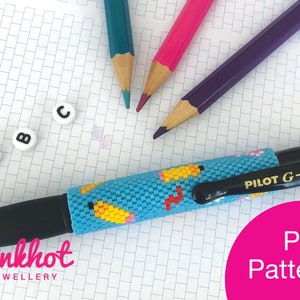 May include: A blue and yellow beaded pen cover with a pencil design. The pen cover is on a sheet of graph paper with colored pencils and letter beads. The text "PILOT G-2 07" and "PDF Pattern" are visible.
